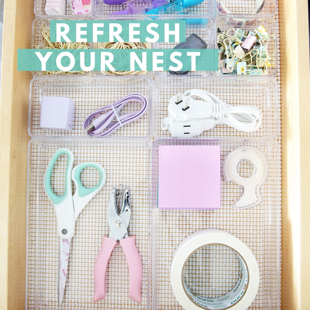 A drawer with different items in it.