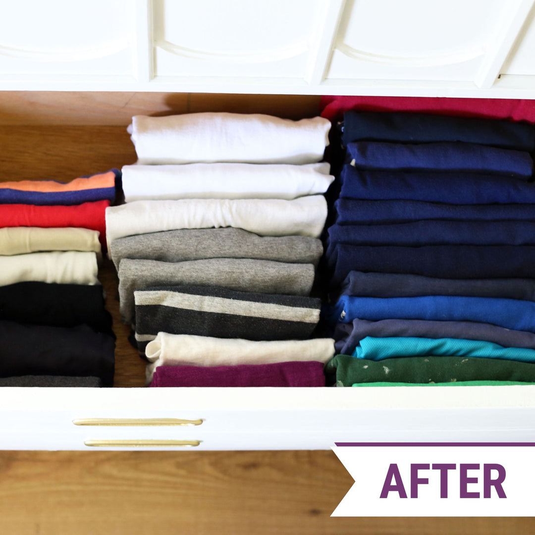Organized dresser drawer with neatly file folded t-shirts lined up in tidy rows